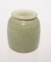 Peter Jaff; Celadon lidded jar with relief linear motif