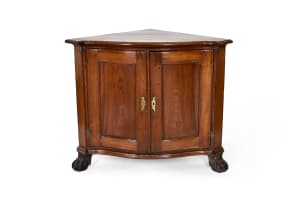 Cape teak bow-fronted corner cupboard, mid 18th century