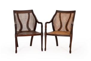 Pair of Regency mahogany and caned library armchairs, 19th century