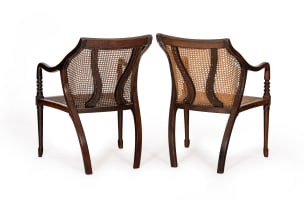 Pair of Regency mahogany and caned library armchairs, 19th century