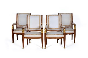 Set of four Empire style mahogany and ormolu-mounted upholstered armchairs, 20th century