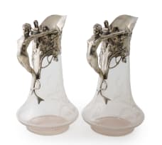 A pair of German Art Nouveau glass and silver-plate mounted claret jugs, WMF, Germany, 1901