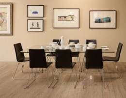 Haldane Martin; Set of eight black leather dining chairs attributed to Haldane Martin, South Africa
