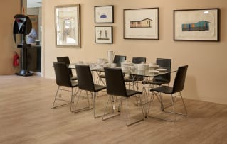 Haldane Martin; Set of eight black leather dining chairs attributed to Haldane Martin, South Africa