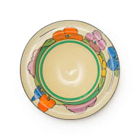 Clarice Cliff; Four Clarice Cliff 'Bizarre' hand-painted bowls with floral and tree border