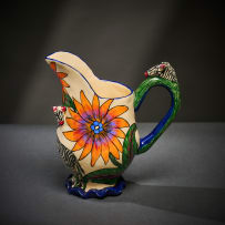 Ardmore Ceramic Studio; Zebra milk jug with orange flowers