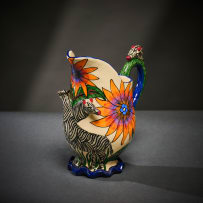 Ardmore Ceramic Studio; Zebra milk jug with orange flowers