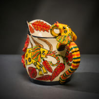 Ardmore Ceramic Studio; Yellow elephant milk jug
