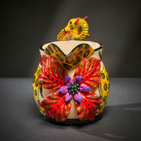 Ardmore Ceramic Studio; Yellow elephant milk jug