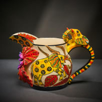 Ardmore Ceramic Studio; Yellow elephant milk jug