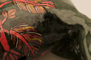 Ardmore Ceramic Studio; Wildebeest and bird candle holder