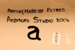Ardmore Ceramic Studio; Zulu figures with lidded vessel