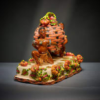 Ardmore Ceramic Studio; Zulu figures with lidded vessel
