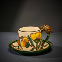 Ardmore Ceramic Studio; Set of eight animal espresso cups and saucers