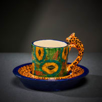 Ardmore Ceramic Studio; Set of eight animal espresso cups and saucers