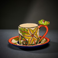Ardmore Ceramic Studio; Set of eight animal espresso cups and saucers