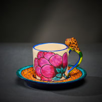 Ardmore Ceramic Studio; Set of six animal espresso cups and saucers