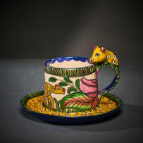 Ardmore Ceramic Studio; Set of six animal espresso cups and saucers