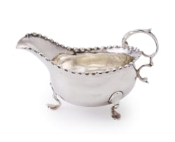 A George III gravy boat, maker worn, London, 1774