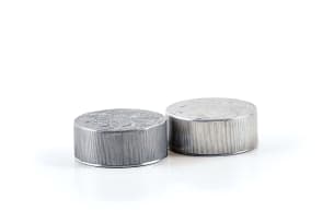 René Lalique; Two René Lalique 'Fleurs d'Amour' aluminium powder compacts for Roger et Gallet, designed 1922