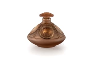 René Lalique; René Lalique 'Quatre Soleil' opalescent and sepia-stained perfume bottle and stopper, No. 505, designed 1912