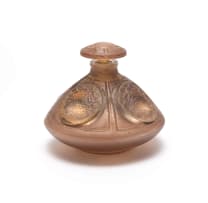 René Lalique; René Lalique 'Quatre Soleil' opalescent and sepia-stained perfume bottle and stopper, No. 505, designed 1912