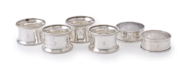 Four George V silver napkin rings, A&JE, Birmingham, 1921