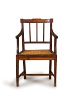 Cape stinkwood and caned Neo-classical armchair, 19th century
