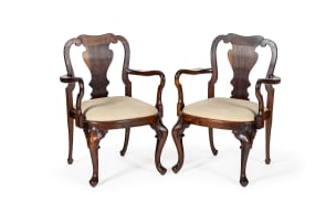 Geo. Parkes & Sons; Pair of Queen Anne style stinkwood armchairs, South Africa, 20th century