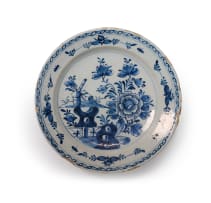 Large Dutch Delft charger with still life and flowers