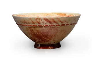 A cream and russet double-glazed bowl with rope motif