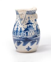 Pearlware blue and white mask jug, 18th century
