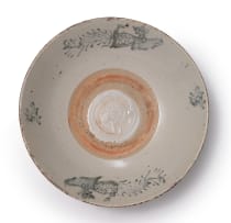 Ming Dynasty blue and white bowl with stamped phoenix bird motif