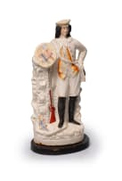 Staffordshire figure of a gamekeeper, circa 19th century