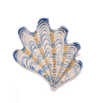 Lucie de Moyencourt; Three glazed ceramic shells with navy and beige motifs