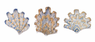 Lucie de Moyencourt; Three glazed ceramic shells with navy and beige motifs