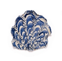 Lucie de Moyencourt; Three glazed ceramic shells with blue and white motifs