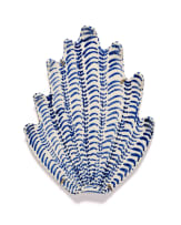 Lucie de Moyencourt; Three glazed ceramic shells with blue and white motifs