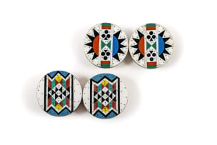 Two pairs of isiZulu 'iziqhaza' earplugs with geometric 'amashaza' designs