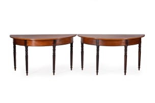Pair of Cape Regency yellowwood and stinkwood demi-lune tables, South Africa, 19th century