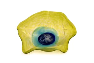 Liz Lacey; Large glass free-form bowl with cobalt blue and turquoise circular inclusion on a yellow ground