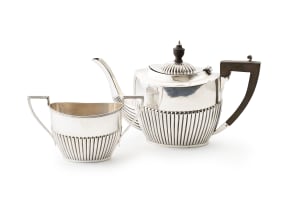 An assembled Edward VII silver teapot and silver-plated sugar basin, William Devenport, Birmingham, 1905