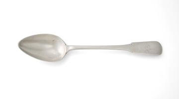 A Cape silver fiddle pattern serving spoon, Johannes Combrink, c.1814-1853
