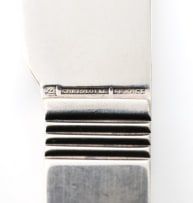 A pair of French silver-plated Christofle bowls and four butter knives
