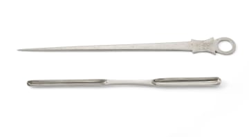 A George III silver meat skewer, John Power, Dublin, 1812; and a marrow scoop, maker's mark SS, London