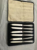 Six George V silver knives, Yates Brothers, Sheffield, 1926