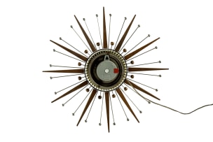 Westclox; Electric atomic-style teak and metal 'Sunburst' wall clock, Scotland