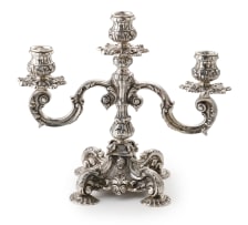A pair of Portuguese silver three-light ornate leaf candelabra, c.1881-1887