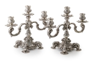 A pair of Portuguese silver three-light ornate leaf candelabra, c.1881-1887