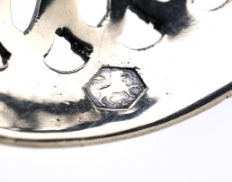 A Dutch silver sugar sifter, maker's mark B.V, .833 standard, 20th century
